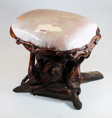 Lot 233 - An occasional table, the large rose quartz top...