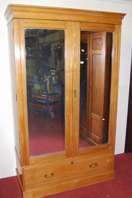 Lot 1114 - A late Victorian ash double mirrored door...
