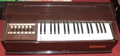Lot 236 - A Magnus electric chord organ