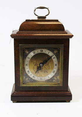 Lot 96 - A walnut cased mantel clock, in the 18th...