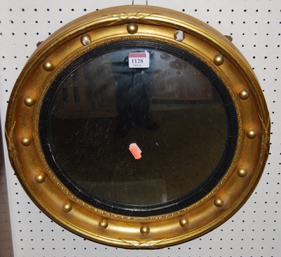 Lot 1128 - A Regency style gilt framed circular convex...