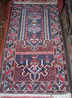 Lot 1143 - A Turkish woollen prayer rug, 150 x 78cm,...