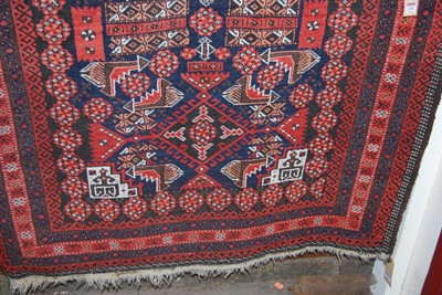 Lot 1157 - A Persian woollen blue ground Tabriz rug, the...