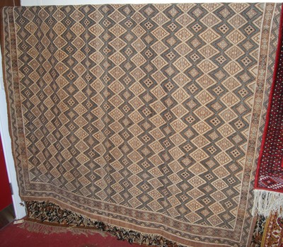 Lot 1160 - A Turkish hand knotted rug, with repeating...