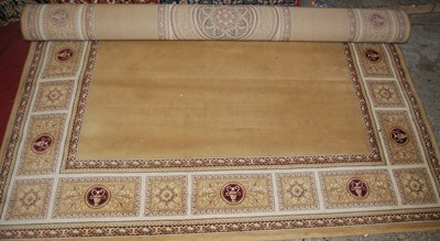 Lot 1161 - A contemporary European machine woven beige...