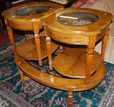 Lot 1168 - A contemporary burr oak and glass inset oval...