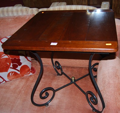 Lot 1169 - A contemporary joined cherrywood and wrought...