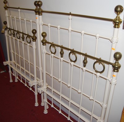 Lot 1172 - A pair of Victorian style cream painted...