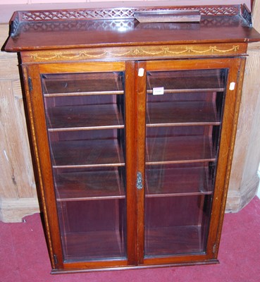 Lot 1180 - An Edwardian mahogany and satinwood inlaid...