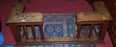 Lot 1182 - A circa 1900 oak club style fender, width 122.5cm