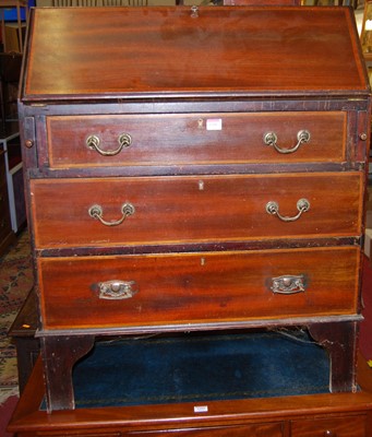 Lot 1208 - An Edwardian mahogany three drawer writing...