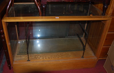 Lot 1213 - A 1930s beech and glazed small shop display...