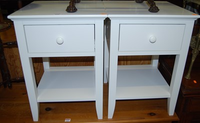 Lot 1220 - A pair of contemporary white wood low single...