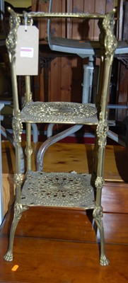 Lot 1222 - A floral decorated pierced brass stand, height...