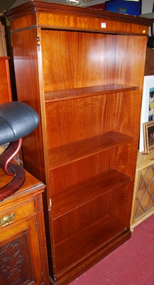 Lot 1225 - A reproduction mahogany freestanding open...