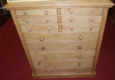 Lot 1228 - A reclaimed pine chest of six short drawers...