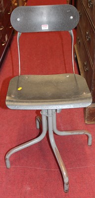Lot 1236 - A set of three 1950s Tan-Sad swivel...