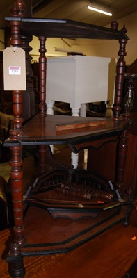 Lot 1258 - A Victorian mahogany and ebonised four tier...