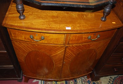 Lot 1259 - A satinwood and crossbanded bowfront double...