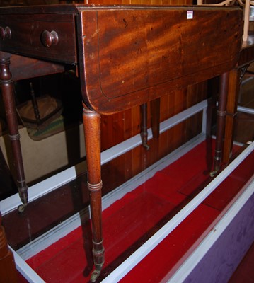 Lot 1263 - An early 19th century mahogany round cornered...