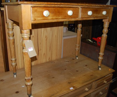 Lot 1269 - A Victorian pine two drawer side table raised...
