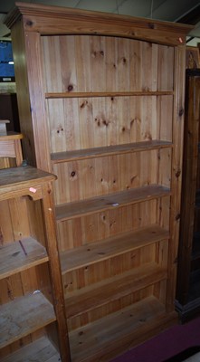 Lot 1275 - A modern pine freestanding open bookshelf,...