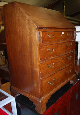 Lot 1278 - An early 19th century mahogany slopefront...