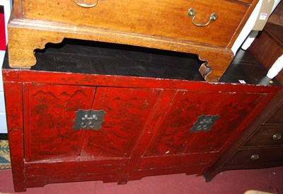 Lot 1280 - A Chinese red and black lacquered low four...
