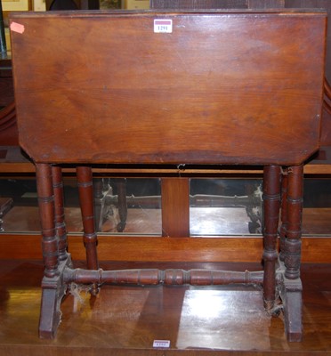Lot 1291 - An Edwardian walnut Sutherland table