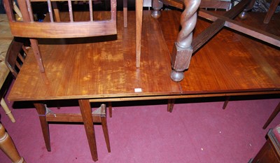 Lot 1298 - A 1960s Maple & Co teak dining suite,...