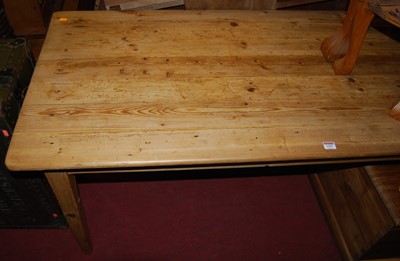 Lot 1307 - A Victorian plank topped pine round cornered...