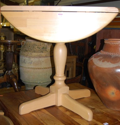 Lot 1314 - A contemporary beech dropflap pedestal kitchen...