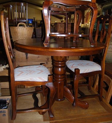 Lot 1317 - A contemporary oak circular pedestal breakfast...