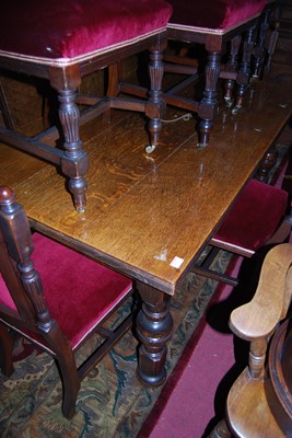 Lot 1363 - An early 20th century oak refectory dining...