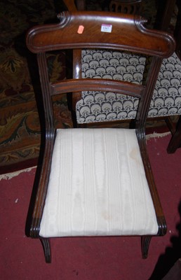 Lot 1367 - A pair of Regency mahogany scroll bar back...