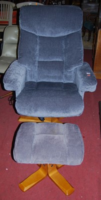Lot 1379 - A contemporary upholstered swivel armchair,...