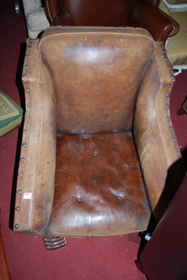 Lot 1391 - A pair of 1930s faded tan leather and studded...
