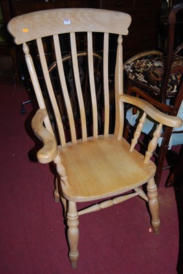 Lot 1396 - A contemporary beech slat back farmhouse open...