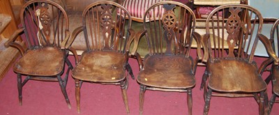 Lot 1406 - Six similar early 20th century elm wheel and...