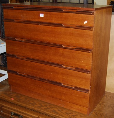 Lot 1414 - A 1970s teak chest of five long graduated...