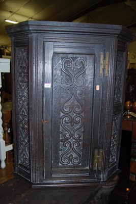 Lot 1429 - A circa 1900 ebonised and floral relief carved...