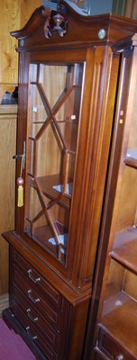 Lot 1433 - A reproduction mahogany side cabinet, having...