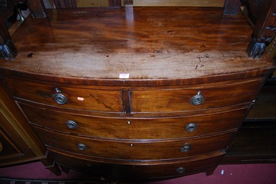 Lot 1440 - A mid-19th century mahogany bowfront chest of...