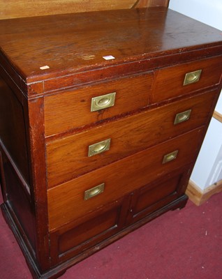 Lot 1449 - An oak military style chest, with two short...