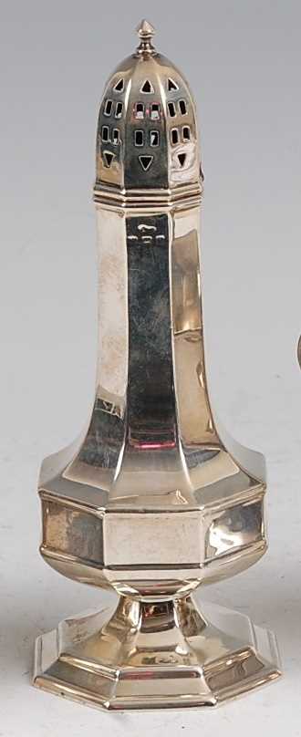 Lot 104 - An Art Deco silver pedestal lighthouse sugar...