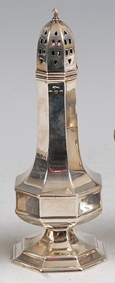 Lot 104 - An Art Deco silver pedestal lighthouse sugar...