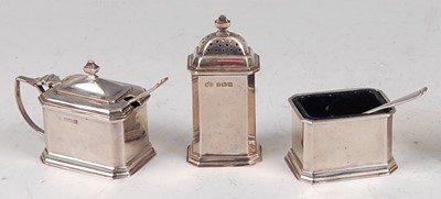 Lot 108 - A small Art Deco silver three-piece condiment...