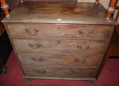 Lot 1123 - A George III faded mahogany chest of four long...