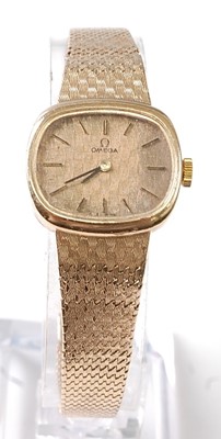 Lot 1245 - A lady's 9ct yellow gold Omega manual wind...