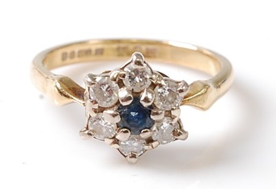 Lot 2743 - An 18ct yellow and white gold, sapphire and...